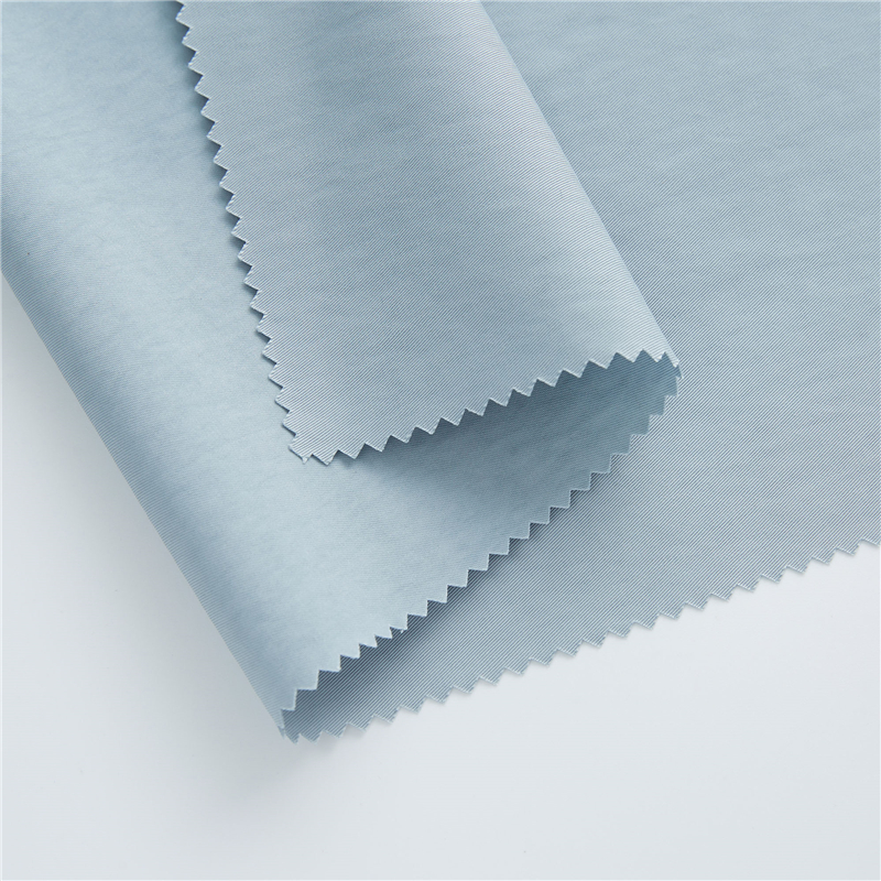 Einfarbiger, umweltfreundlicher, lässiger Mantelstoff aus 57 % Baumwolle, 43 % Nylon-Twill